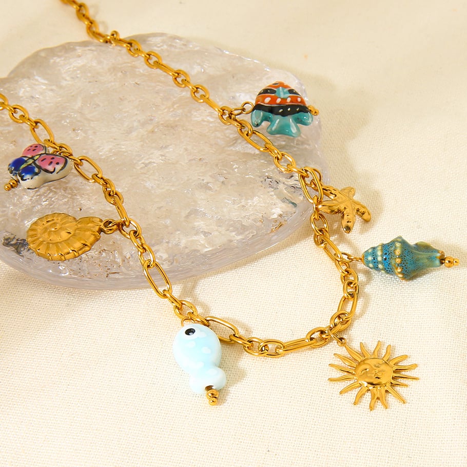 Bedelketting zon blauw/groen goud
