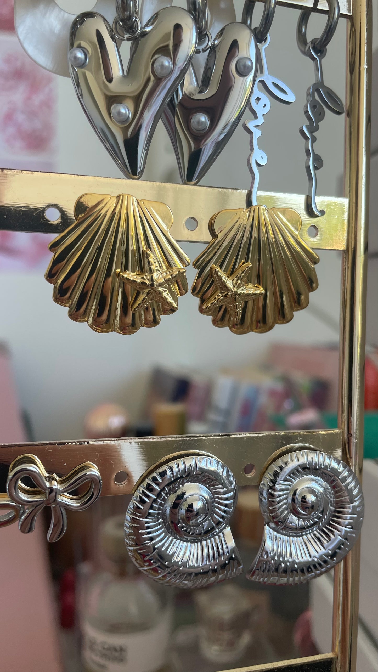Schelp oorbellen goud