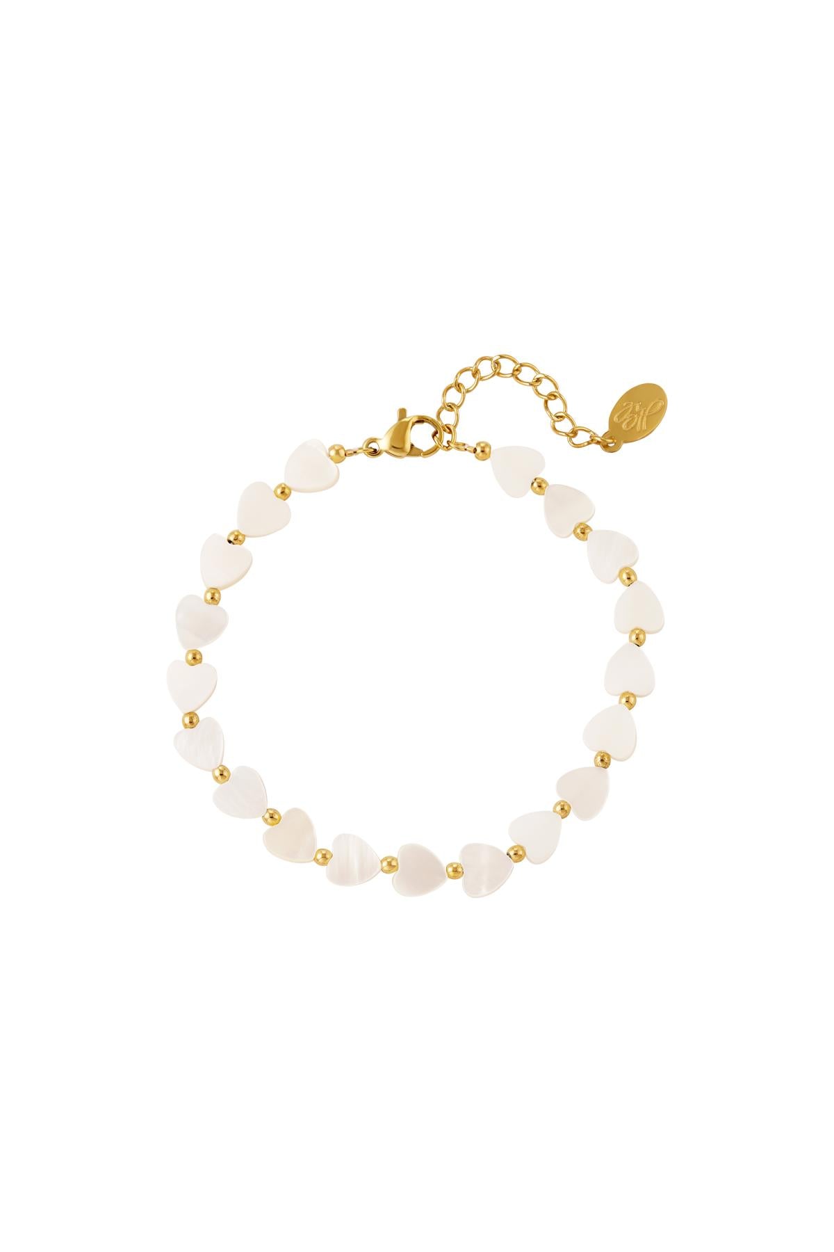 Witte hartjes armband goud