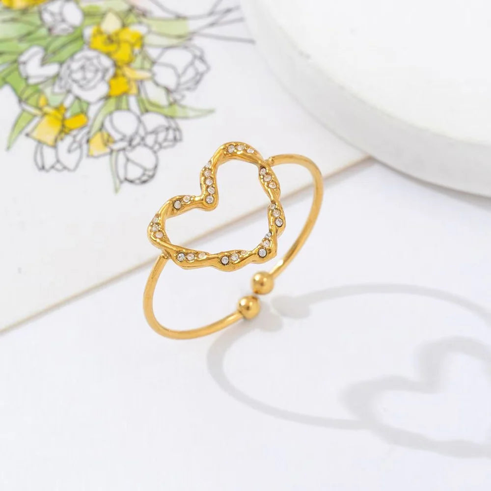 Ring met hartje steentjes goud