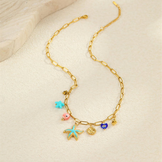 Bedelketting blauwe zeester goud