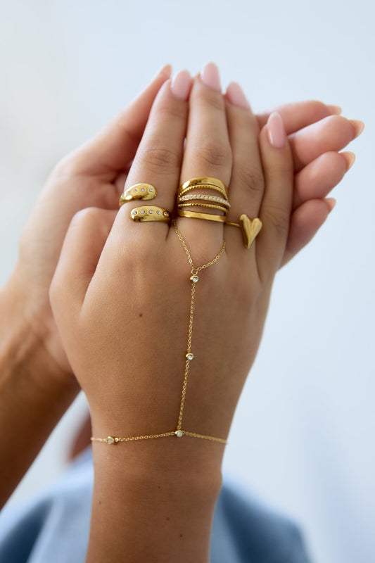 Handchain met steentjes goud