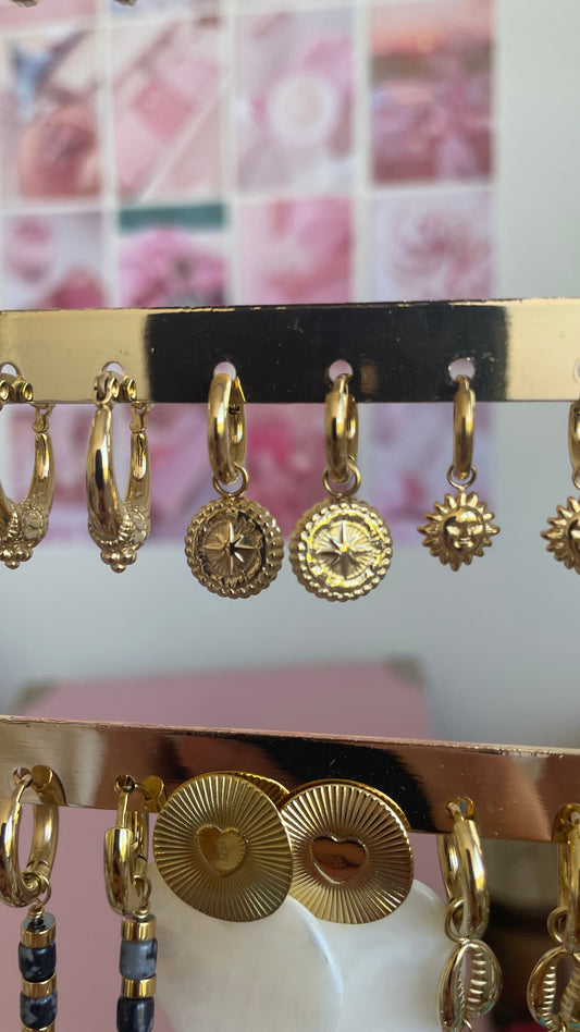 Ster oorbellen goud