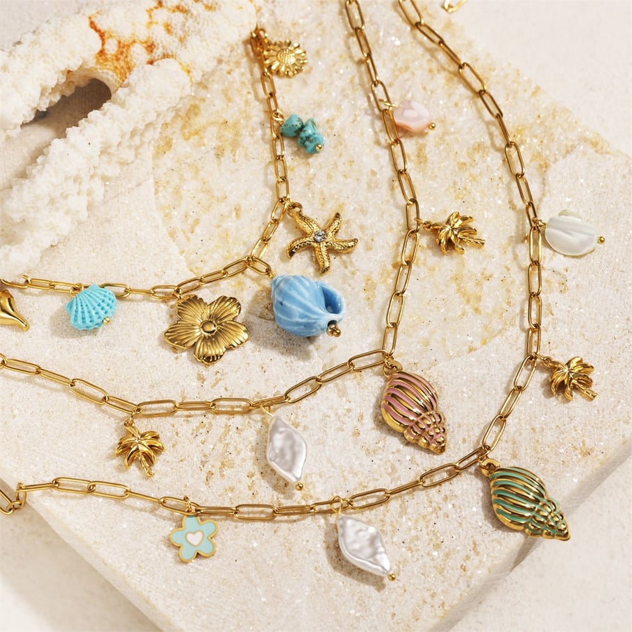 Bedelketting blauwe schelp goud